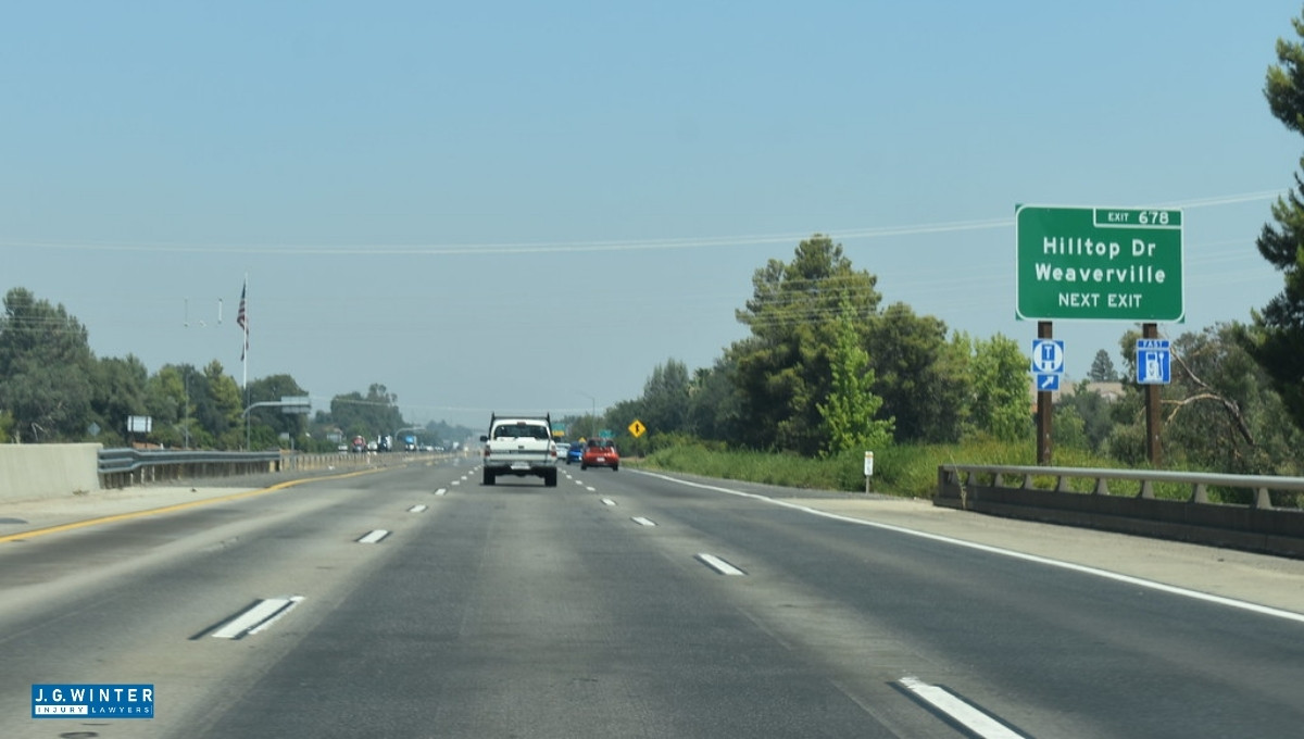 Redding, CA - Two Injured in Rollover Crash Involving Semi on I-5 Near Hilltop Dr